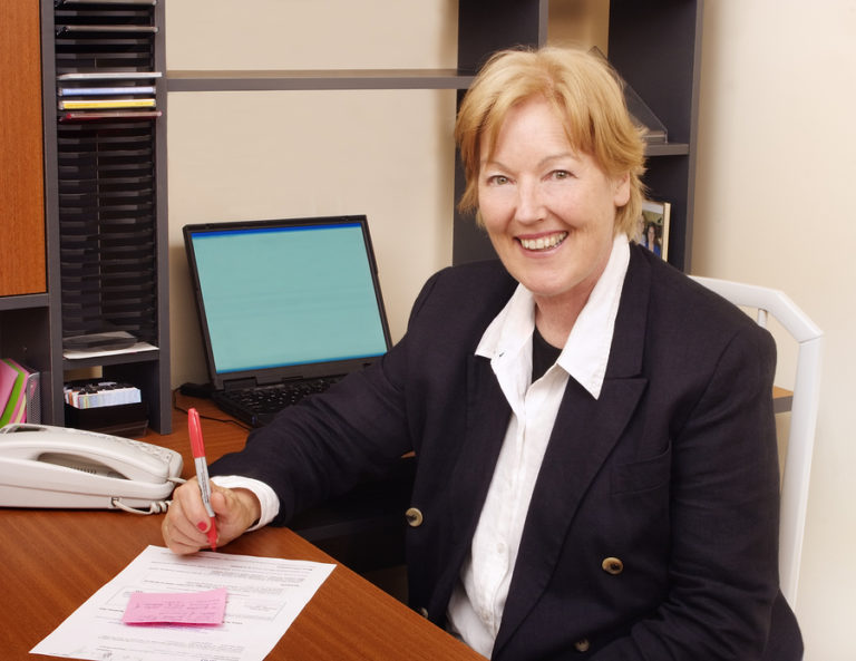 happy business woman in office